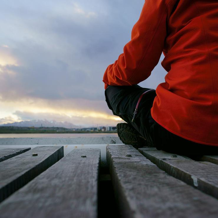 Istock image for MCBT Meta analysis paper Person sitting and meditating