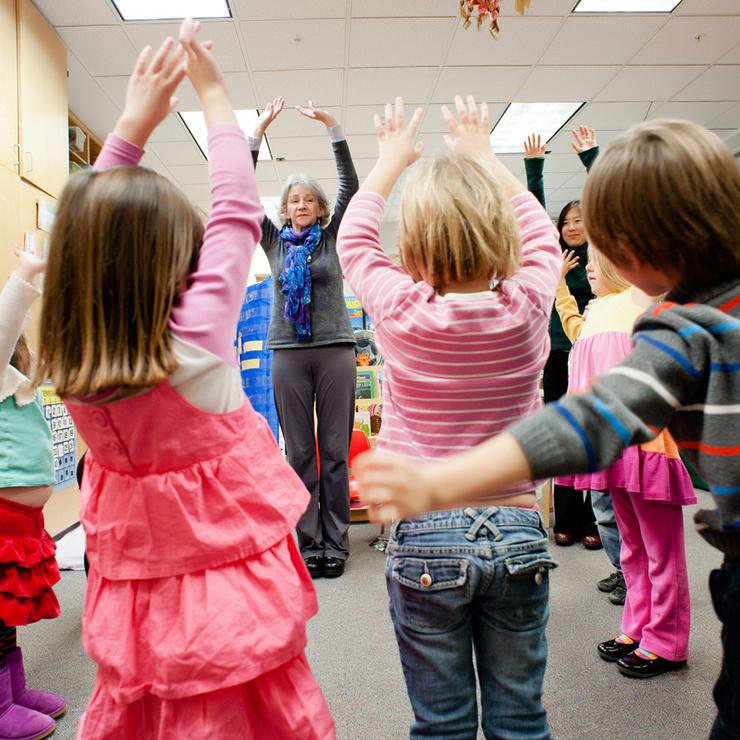 Young kids participate in mindful movement as part of Kindness Curriculum