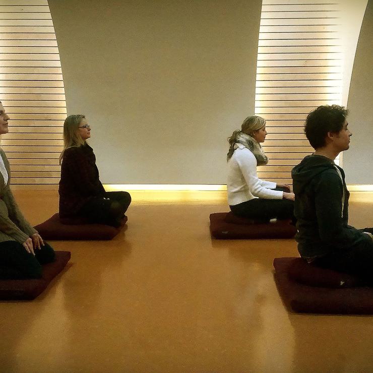 Photo of group meditating